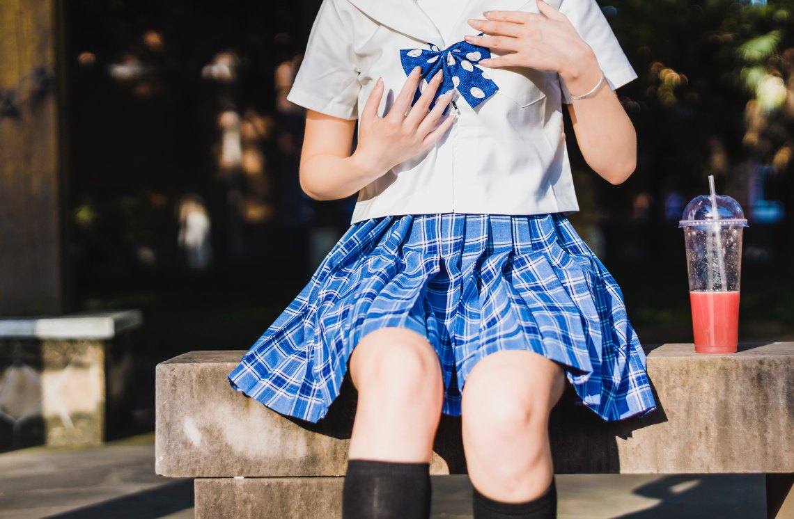 girl in a skirt and knee highs