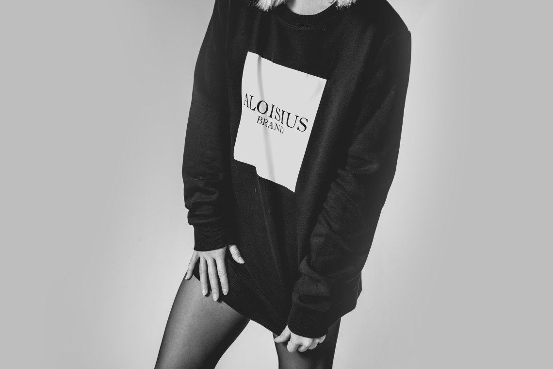 woman in a black sweatshirt