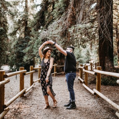 couple dancing in the woods