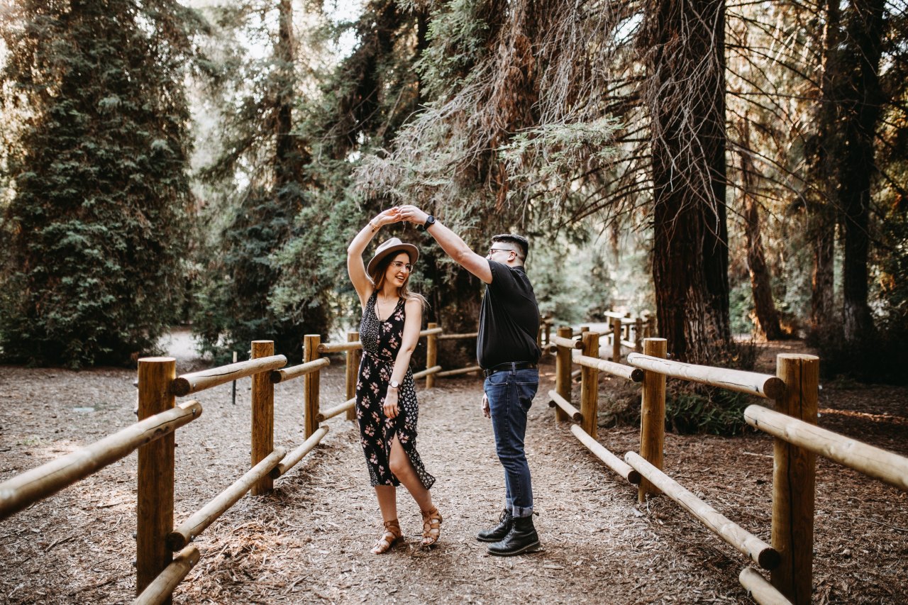 couple dancing in the woods