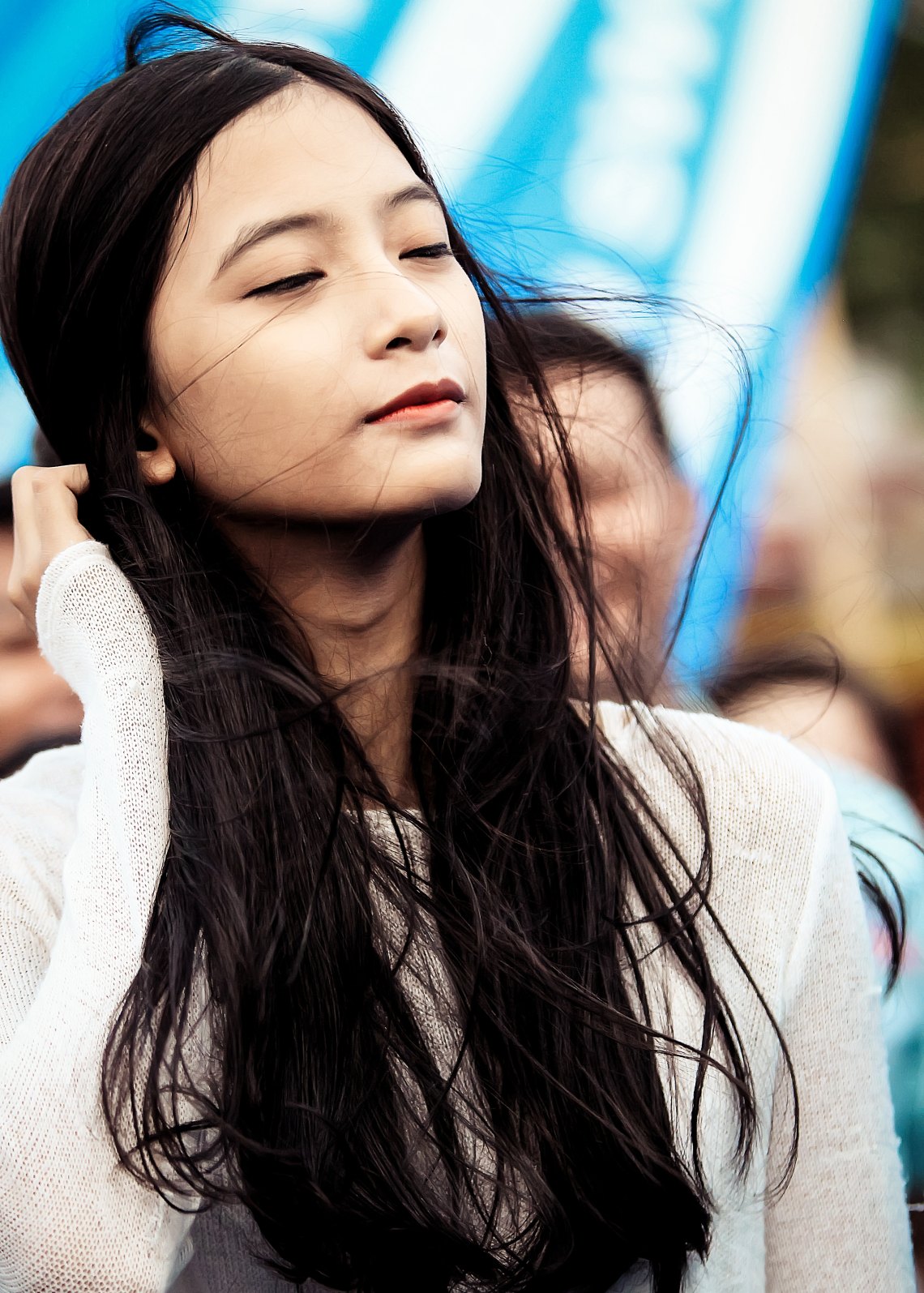 woman standing in wind