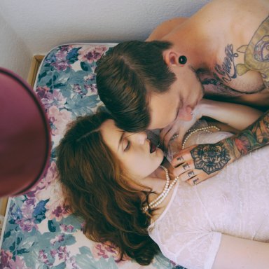 couple laying in bed together