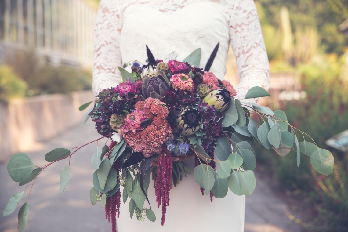 bride holding a massive bouquet