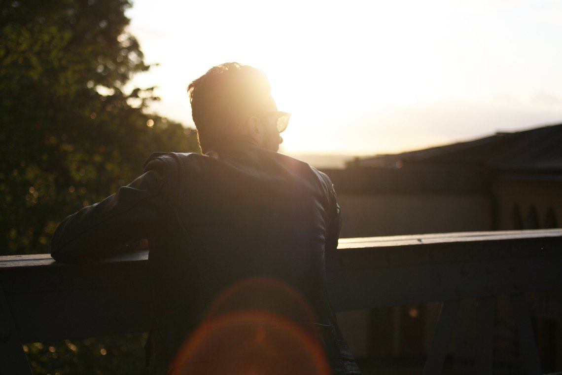 man standing and thinking