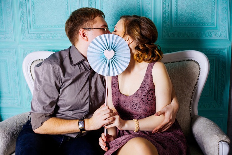 couple kissing on a date