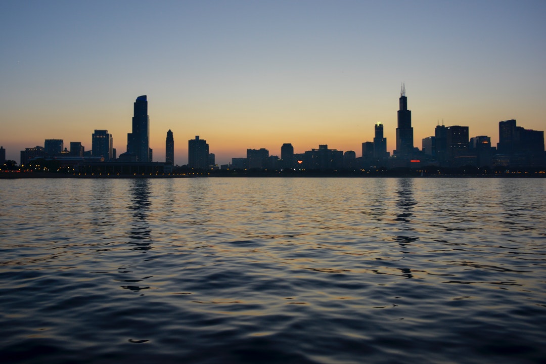 The skyline of Chicago seen from the Michigan Lake at sunset
