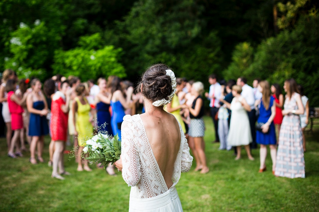 Bride prepares to throw the bouquet