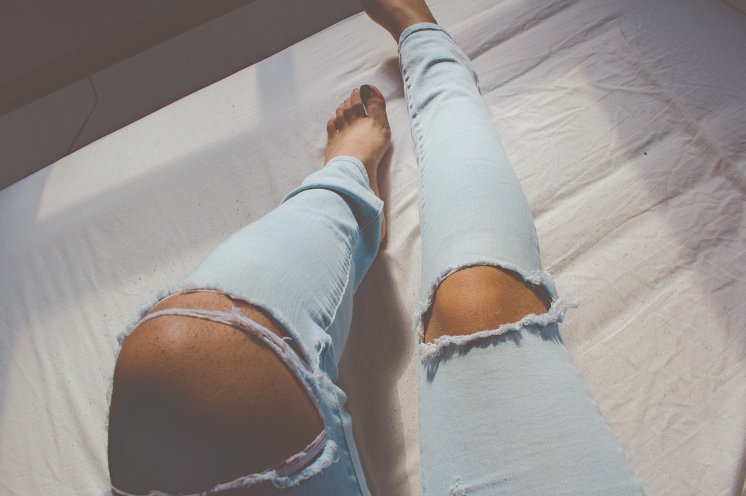 women's distressed blue denim jeans