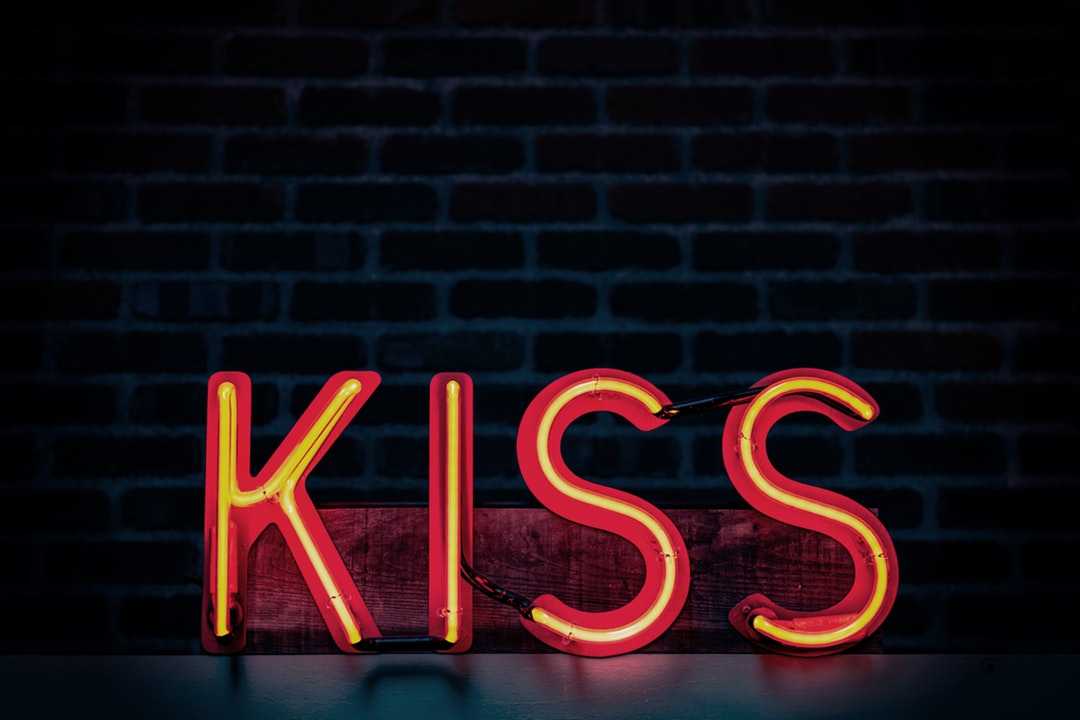 red Kiss neon signage