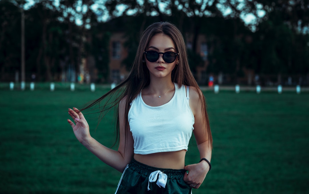 woman in white crop top