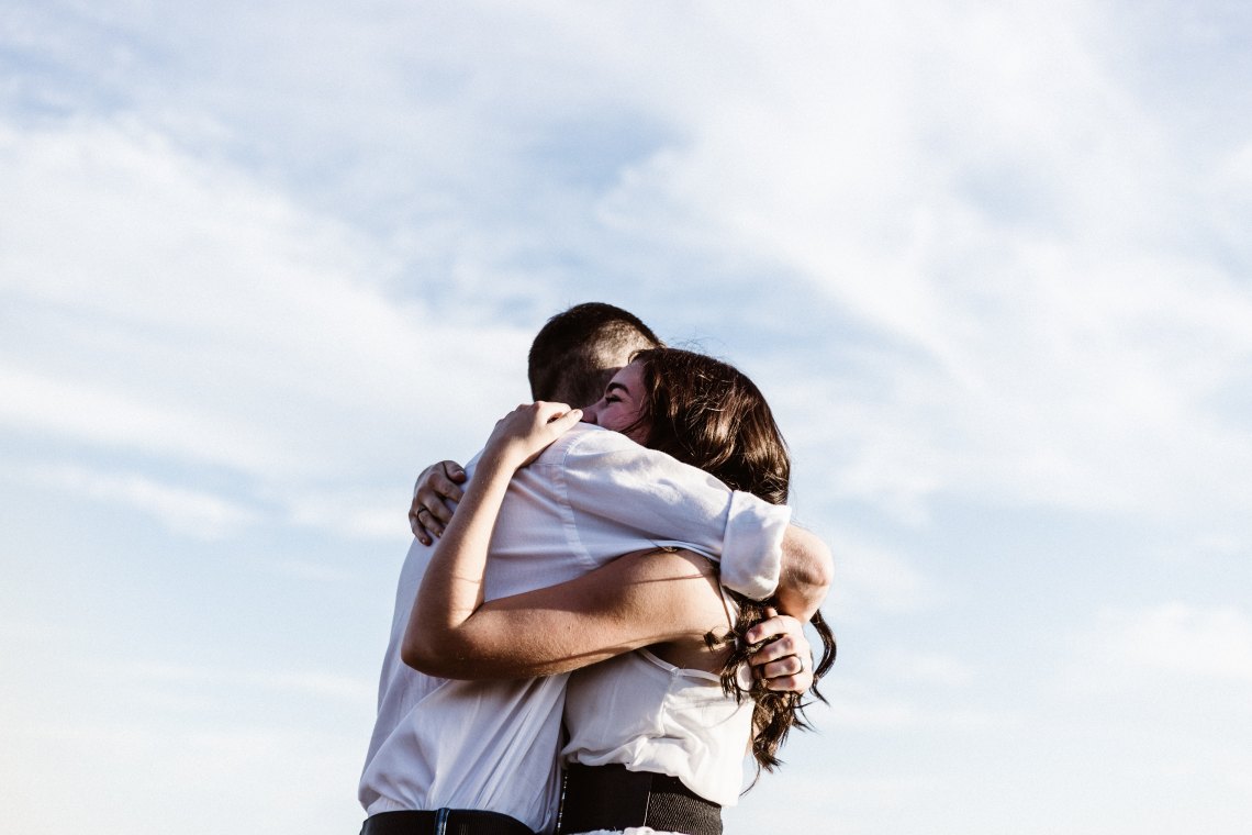 happy couple hugging