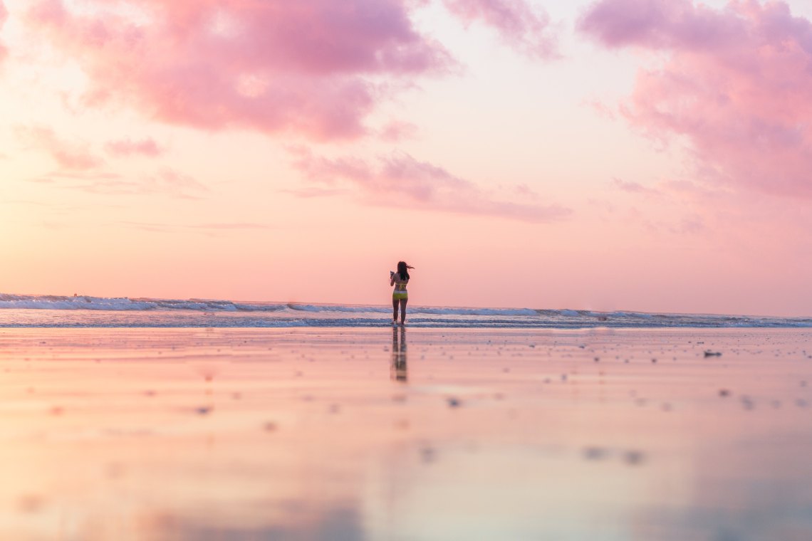 girl on a sunset beach