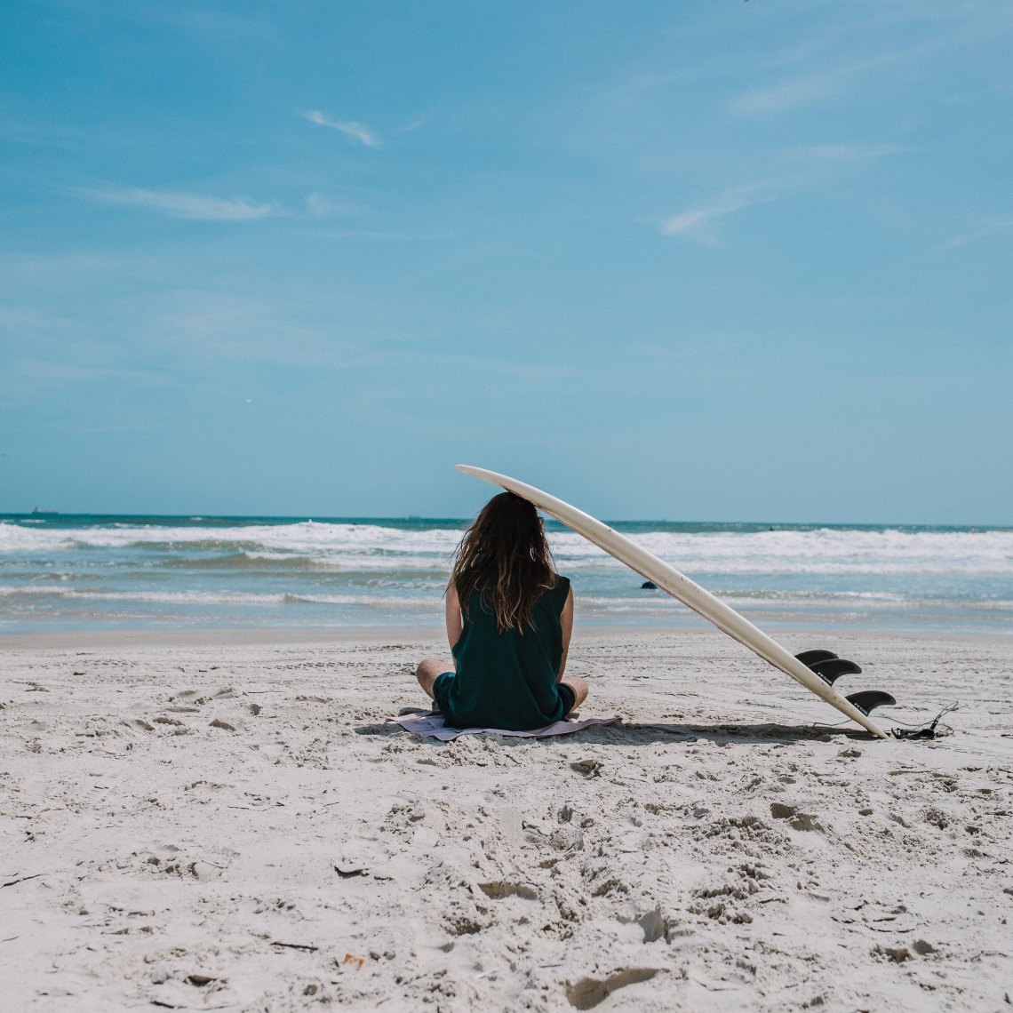surfboard on her head