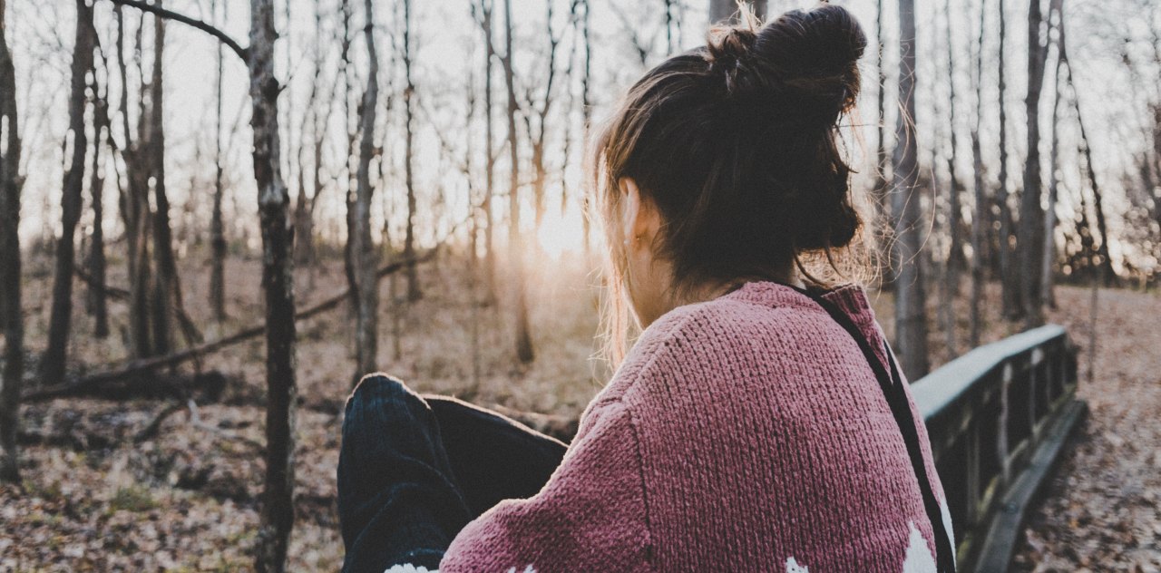 girl looking through forest, sitting girl, your pain was not meant to be, you are strong, you will rise