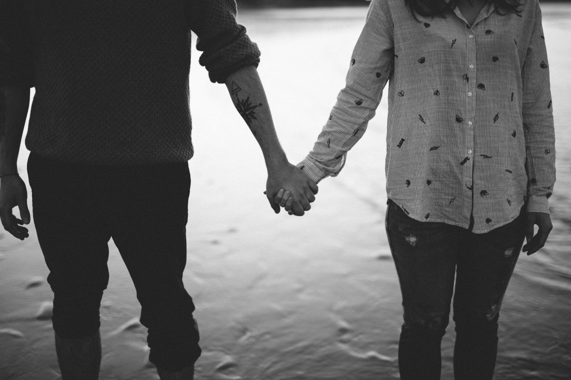 couple holding hands
