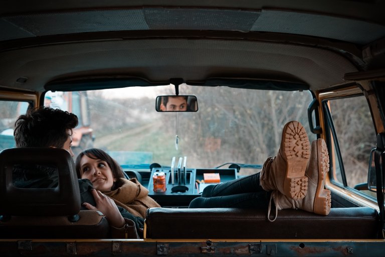 couple relaxing in a car