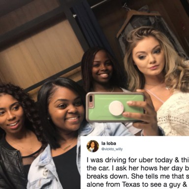 The girl and her uber driver and friends pose for a picture