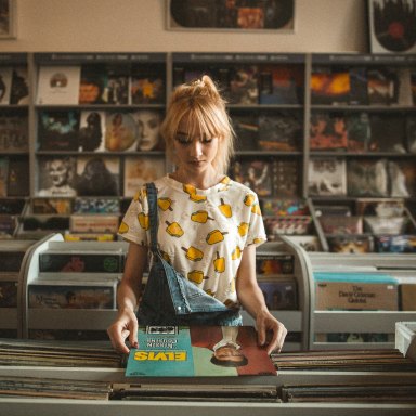 girl at a record store