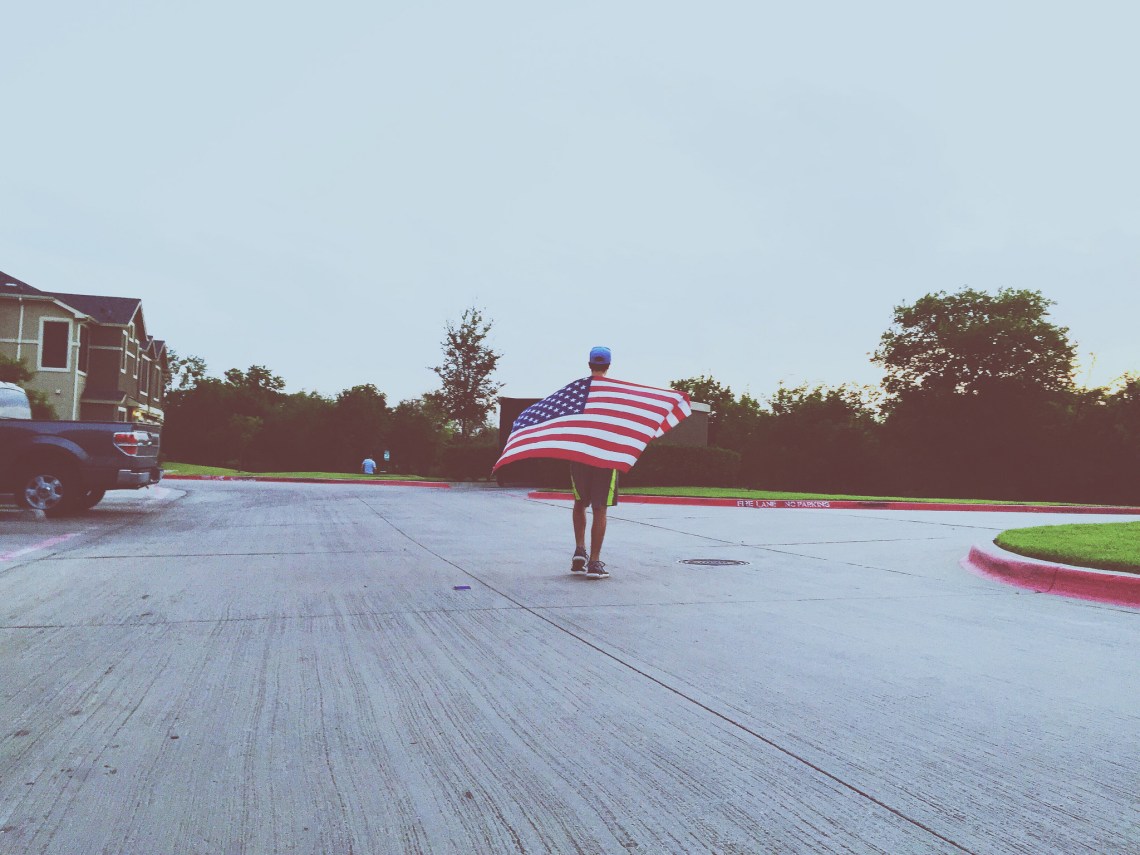 man with an american flag