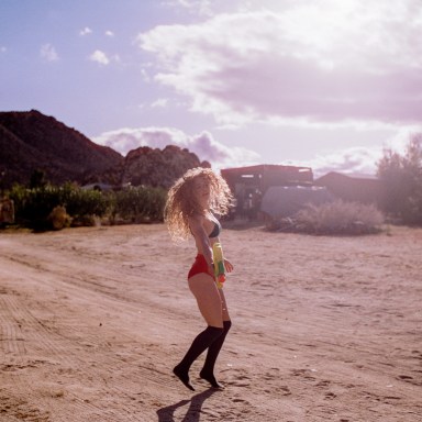Girl playing in the desert