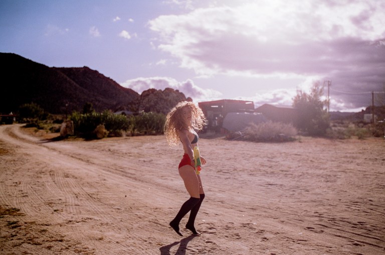 Girl playing in the desert