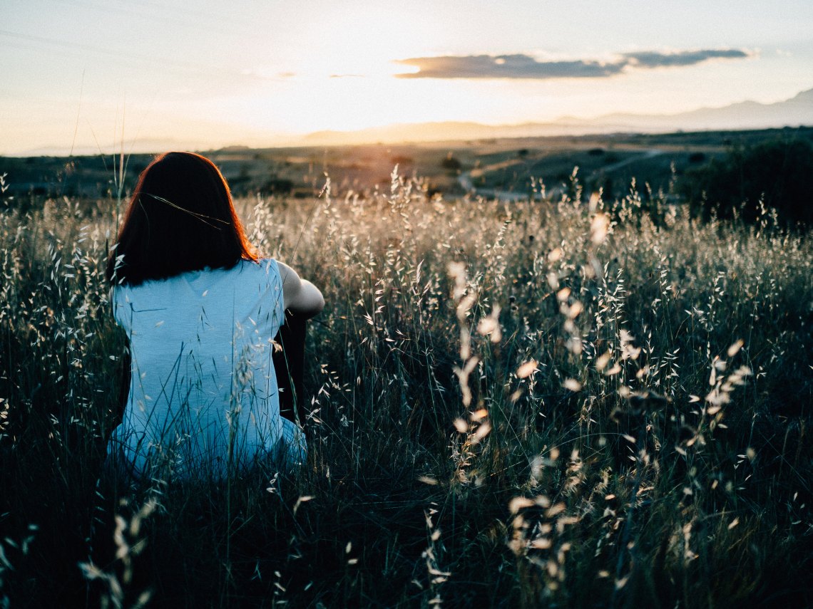 pensive in a field