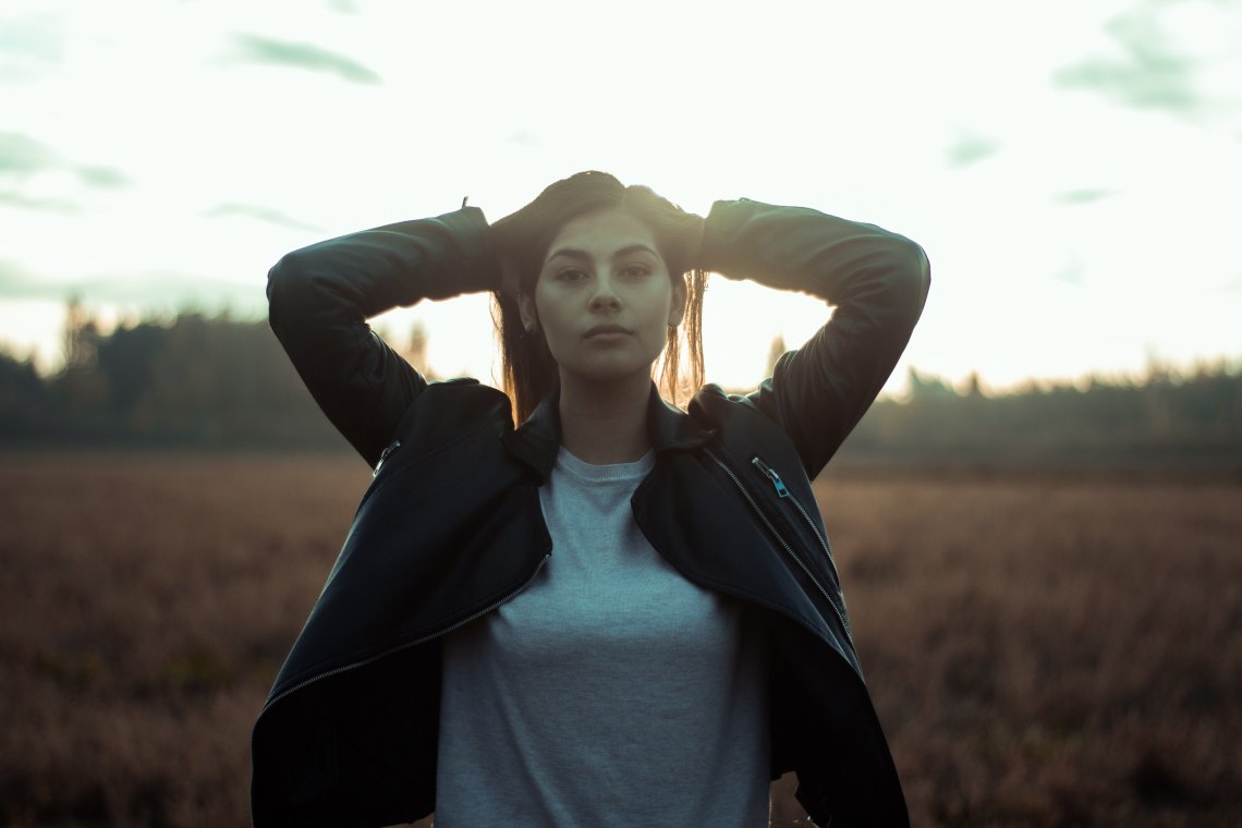 woman standing in field