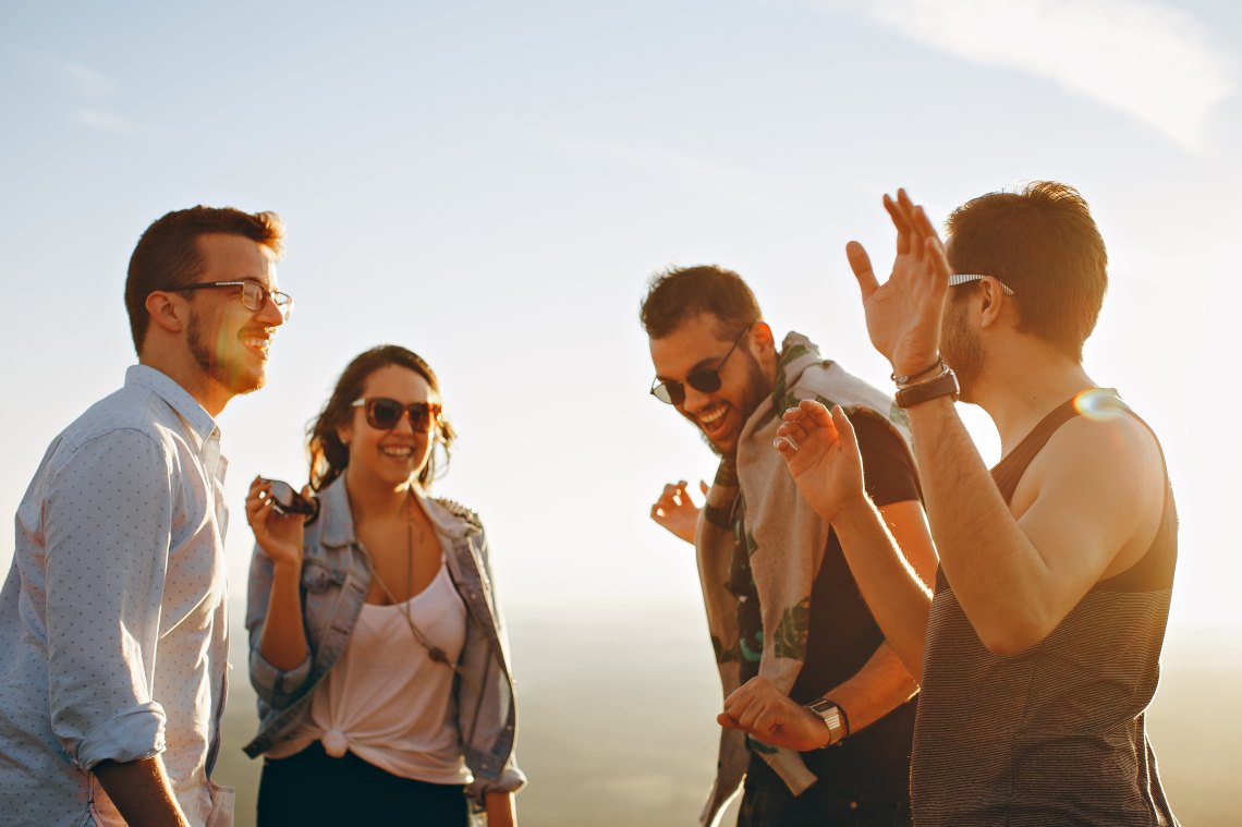 friends laughing in the sun