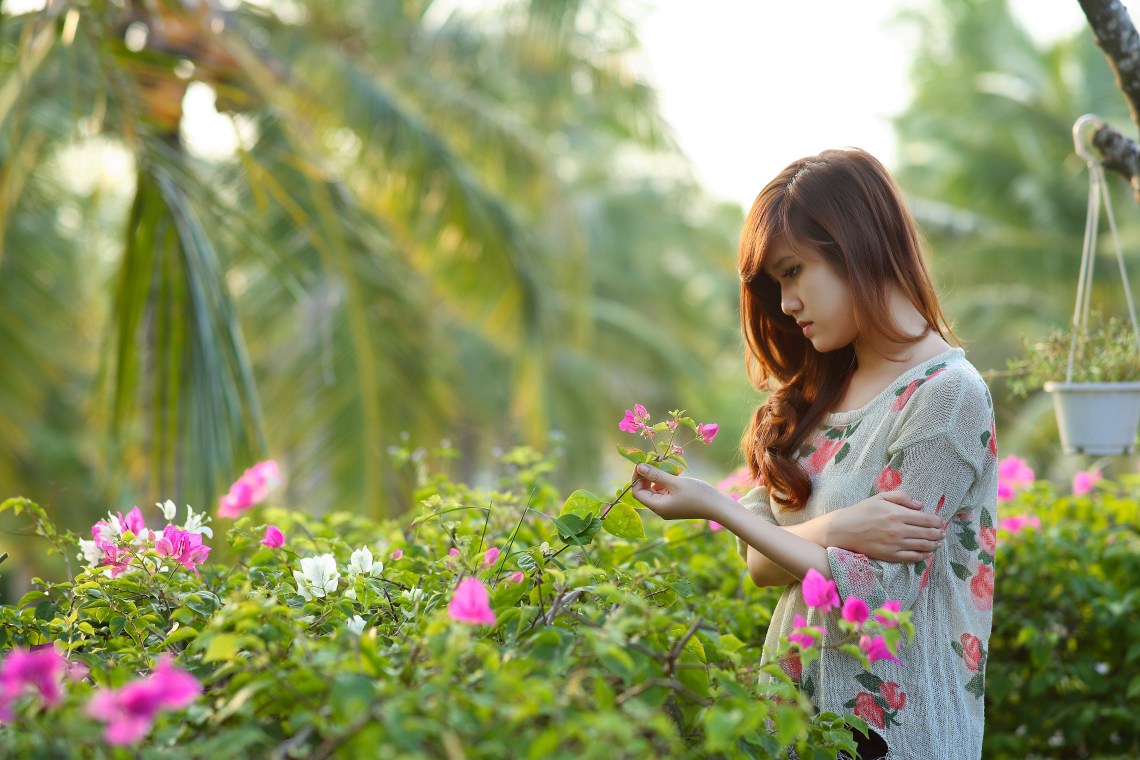 girl and pink flowers