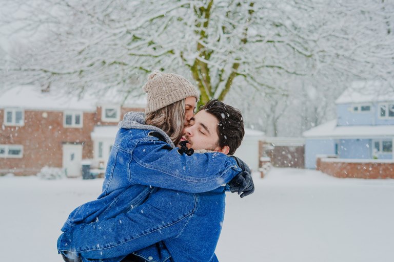 hugging couple, happy couple, snow couple, love, extravagant love, real love