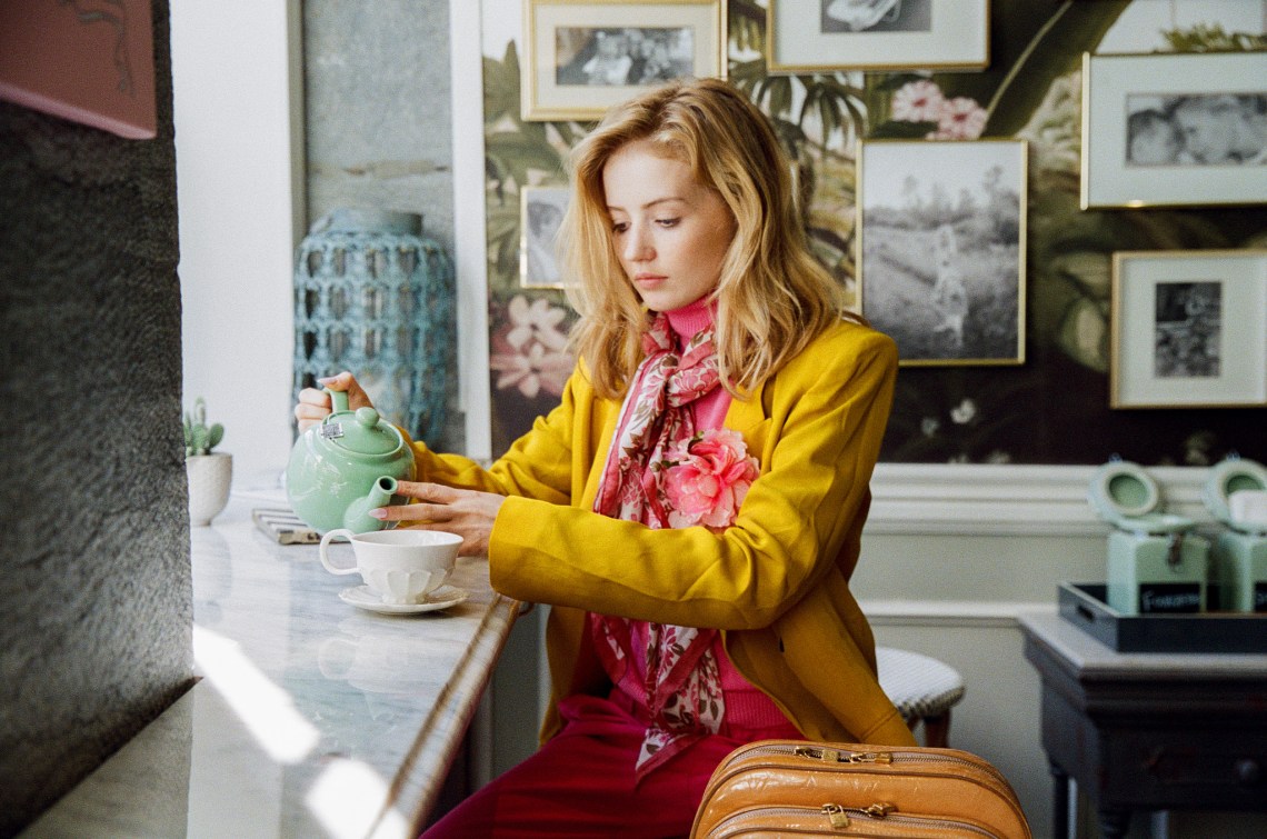 girl pouring herself some tea
