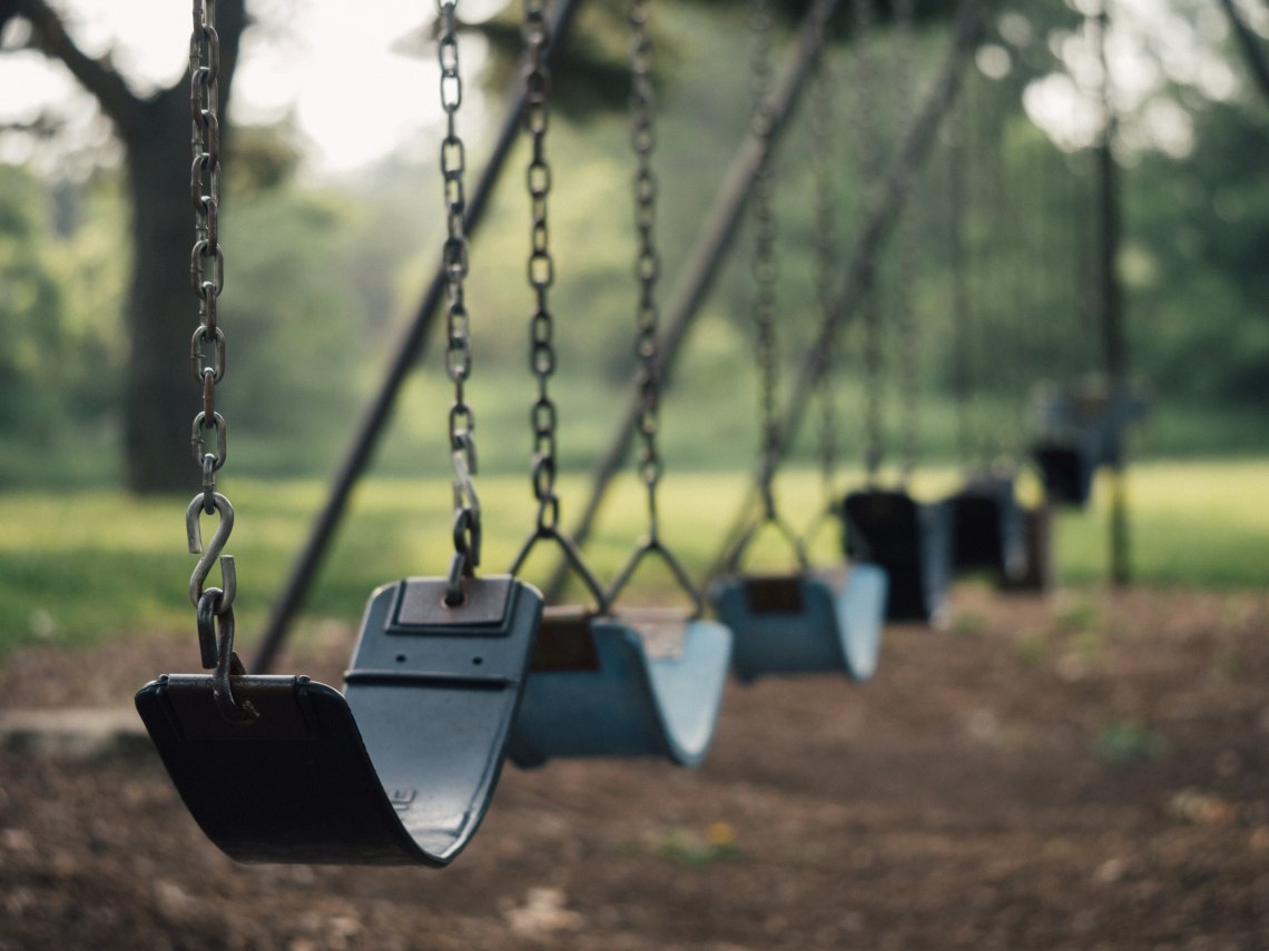 swings in a park made for kids