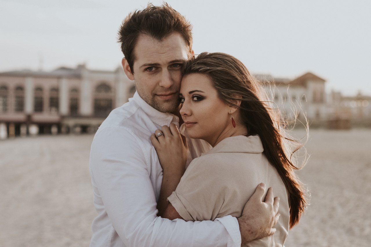 Couple embracing on beach