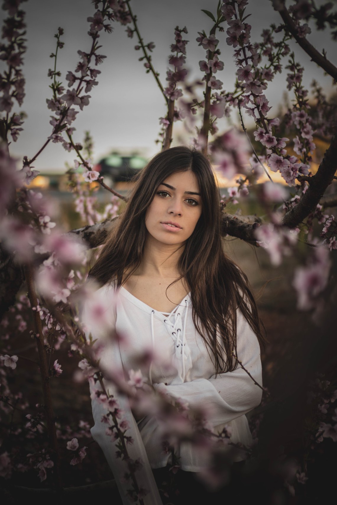 woman standing in flowers