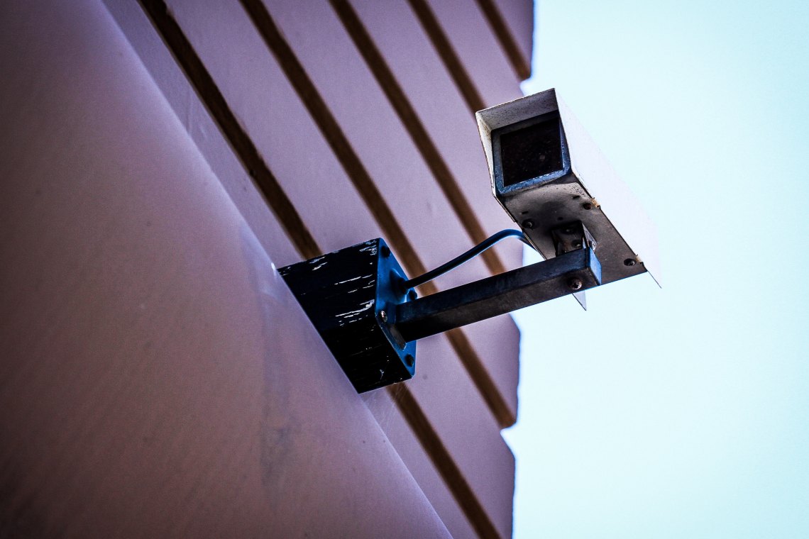 Security camera on the side of a building