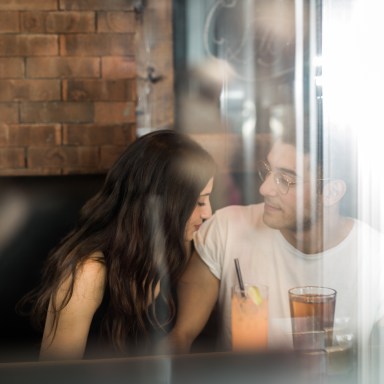 couple looking close at bar