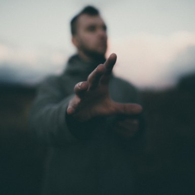 A creepy, blurry guy reaching out toward the camera