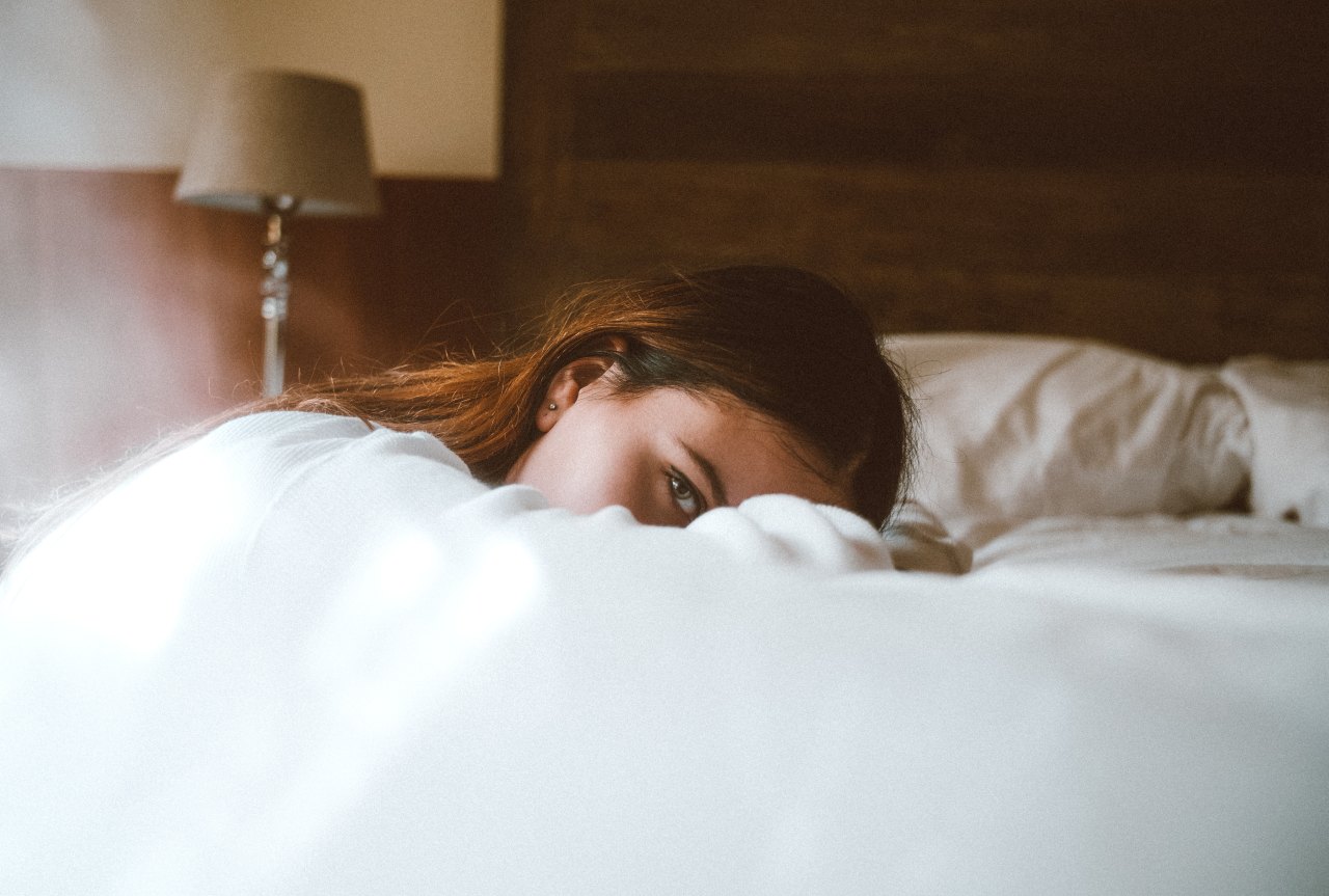 A girl alone, away from her friends