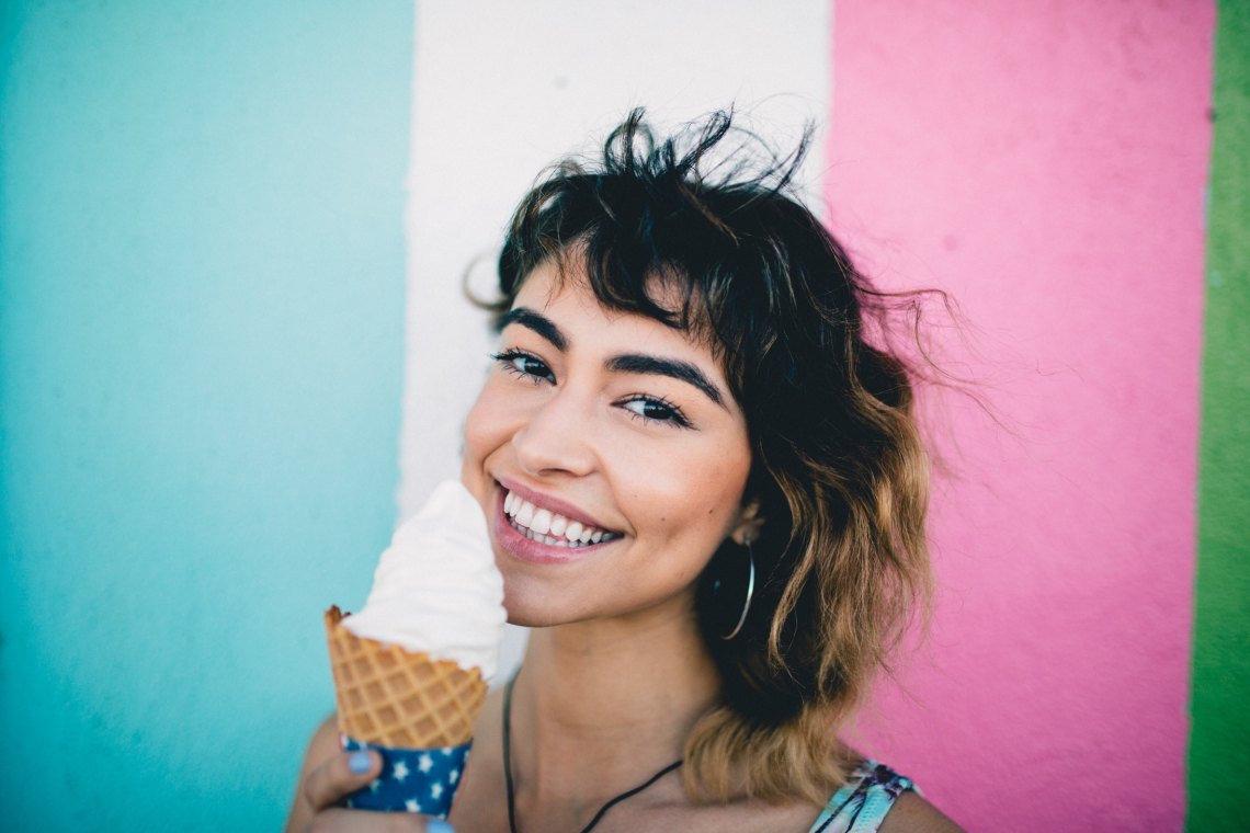 girl licking ice cream
