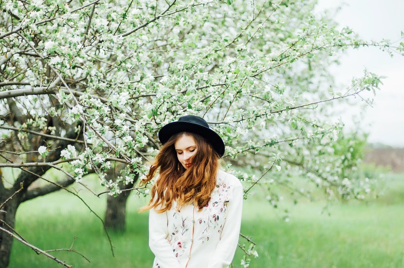 woman wearing hat in spring
