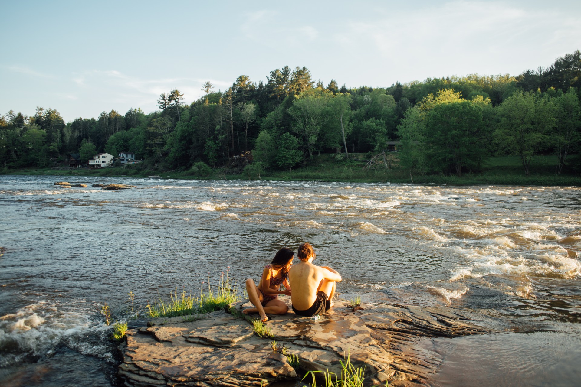 couple having fun by river