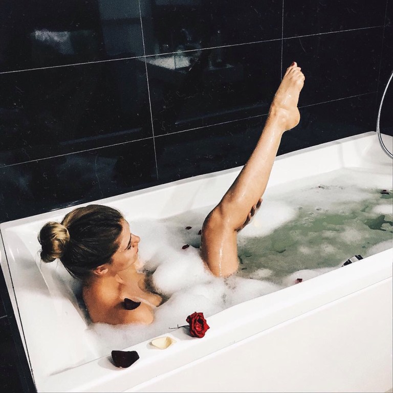 woman taking bubble bath