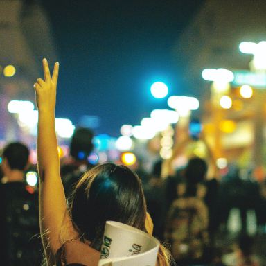 woman raising his hand