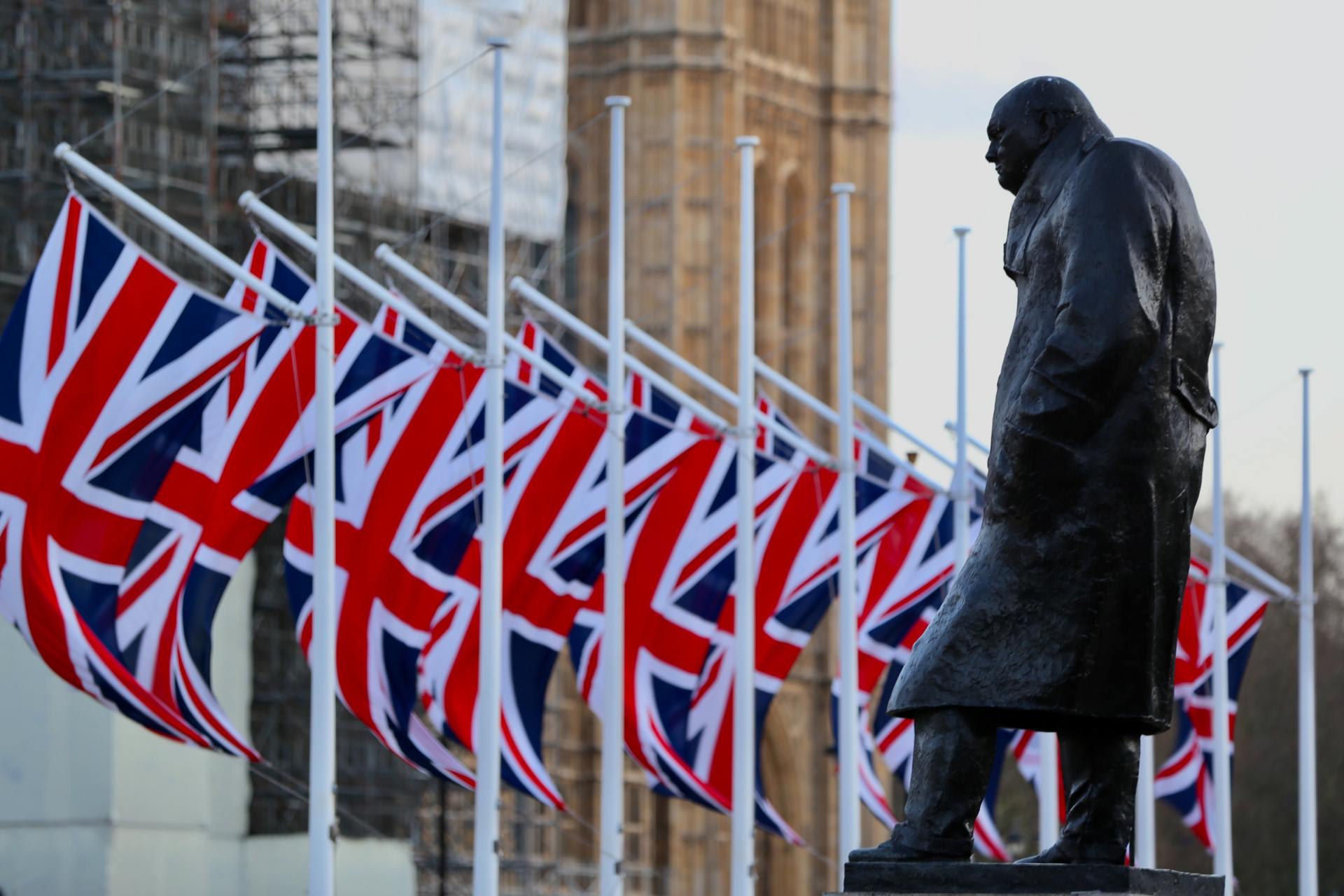 Winston Churchill near the English flag