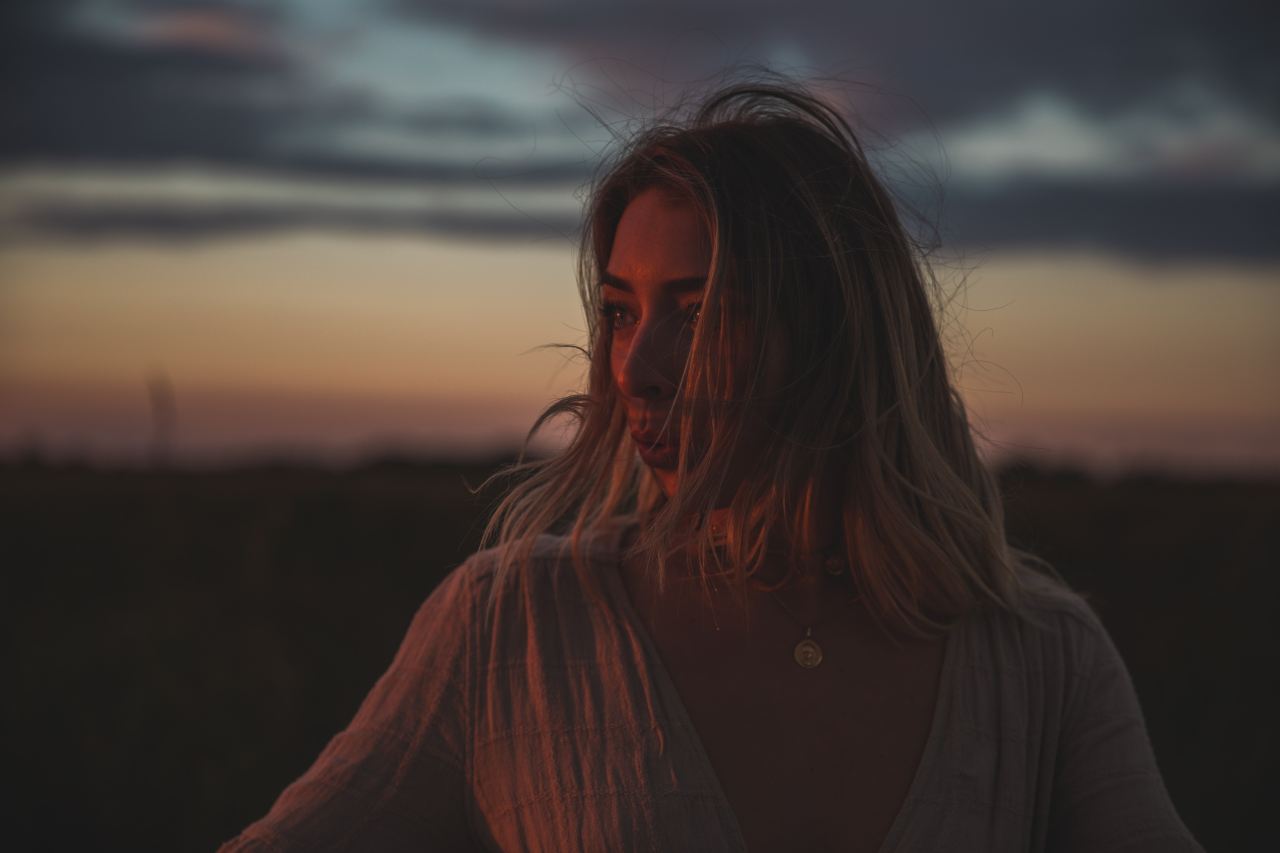 woman wearing white scoop-neck shirt