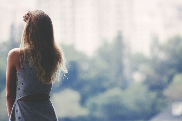 selective focus photography of woman standing