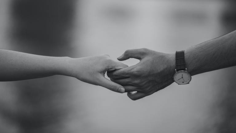 Monochrome Photo pf Couple Holding Hands