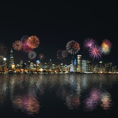 skyline buildings under fireworks display