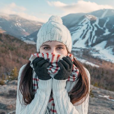 woman standing on mountain during daytime