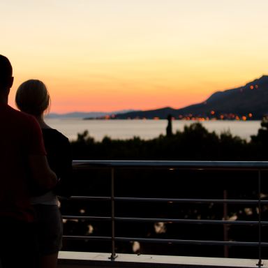 silhouette of couple on terrace